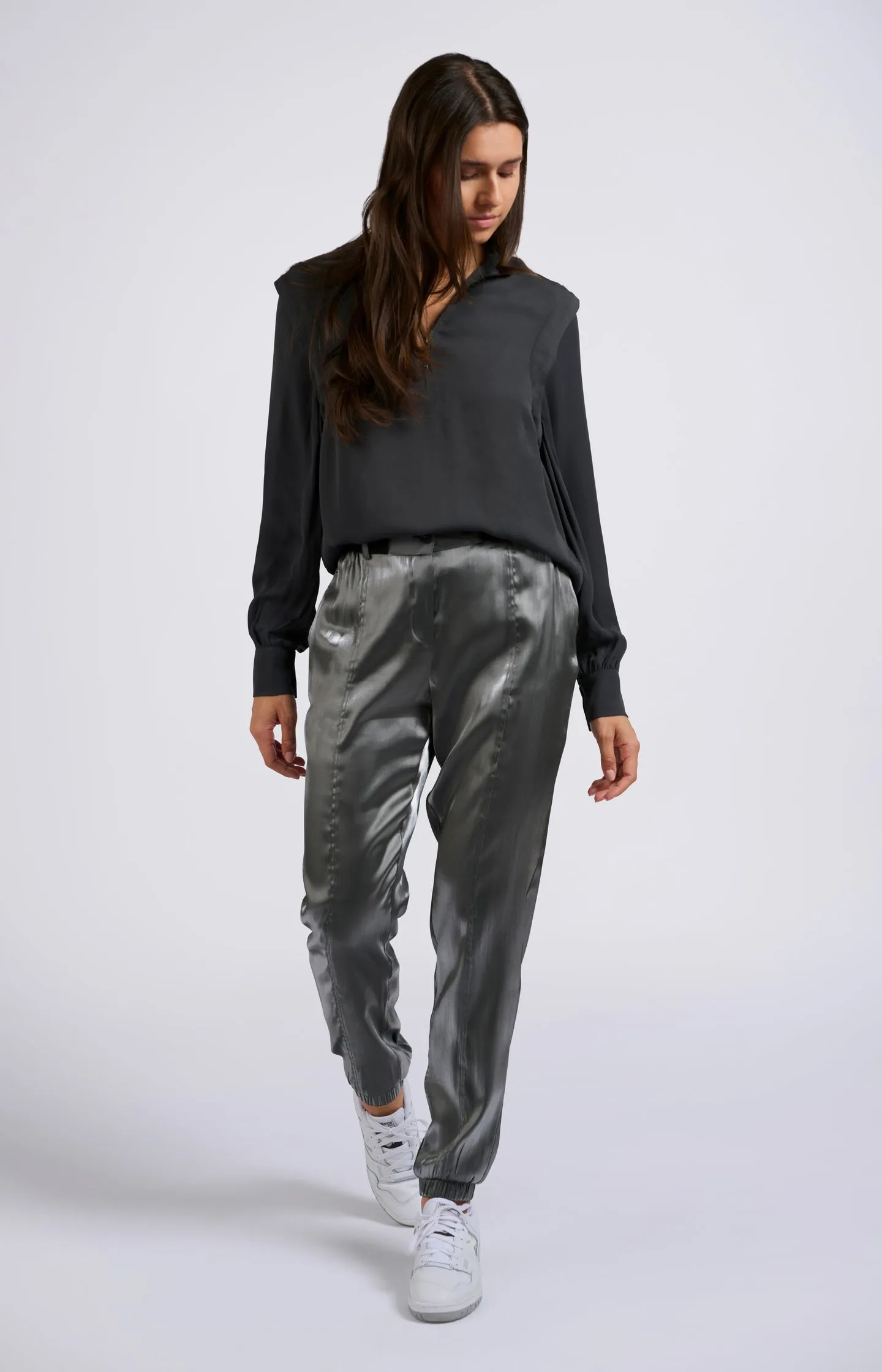 Black blouse with long sleeves, pleats and high turtleneck